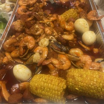 Loaded combo — shrimp, mussels, eggs and corn